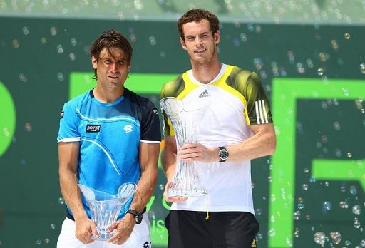 Andy Murray (R) celebrates next to David Ferrer on March 31, 2013 in Key Biscayne