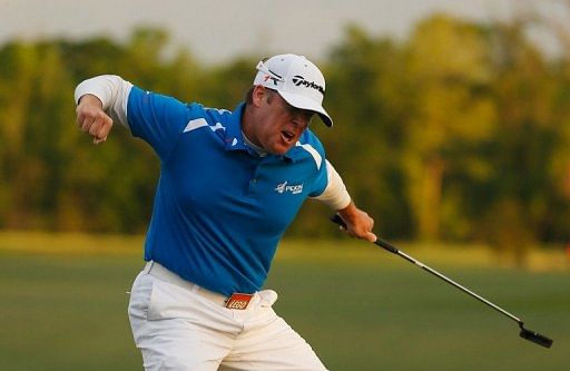 D.A. Points celebrates his par putt on the 18th green during the final round of the Houston Open on March 31, 2013