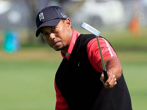 Tiger Woods makes a birdie attempt during the Arnold Palmer Invitational final on March 25, 2013 in Orlando, Florida