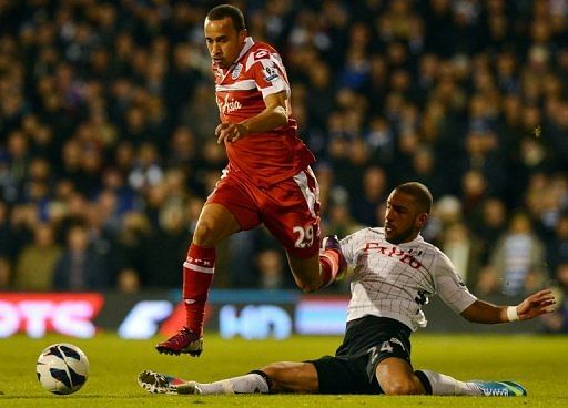 QPR midfielder Andros Townsend (L) and Fulham midfielder Ashkan Dejagah are pictured during their match on April 1, 2013