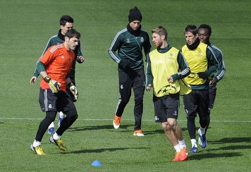 Real Madrid players take part in a training session at the Valdebebas training ground in Madrid, on April 2, 2013