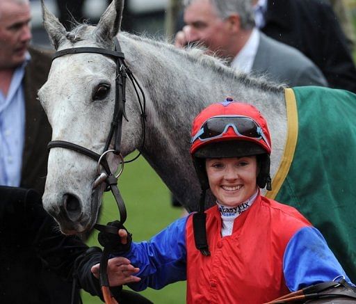 Katie Walsh, alongside Thousand Stars, in the winners&#039; enclosure at the Cheltenham Festival on March 19, 2010