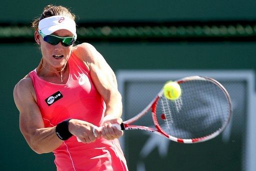 Stosur, Wozniacki advance at Charleston