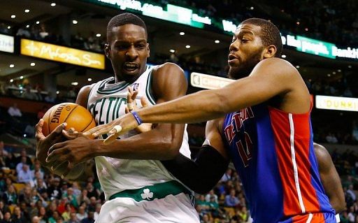 Jeff Green (L) secures a loose ball against Greg Monroe on April 3, 2013