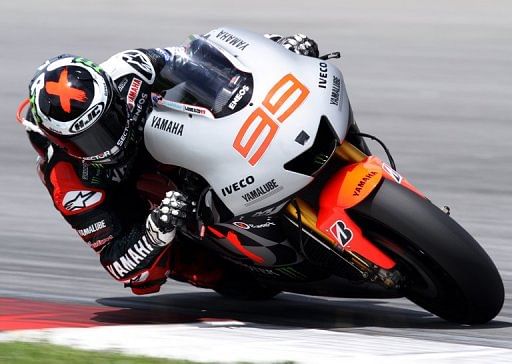 Yamaha MotoGP rider Jorge Lorenzo  takes a corner in the pre-season MotoGP test at the Sepang circuit, February 26, 2013