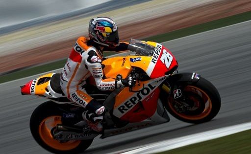 Repsol Honda team MotoGP rider Dani Pedrosa of Spain during pre-season testing at the Sepang circuit on February 5, 2013