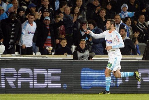 Marseille&#039;s Andre Pierre Gignac celebrates after scoring a goal against Bordeaux, in Marseille, on April 5, 2013