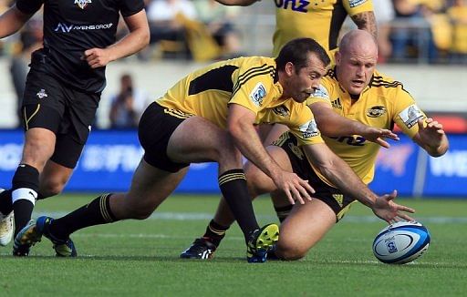 Conrad Smith (left) and Ben Franks of the Hurricanes during their Super 15 match in Wellington on March 30, 2013