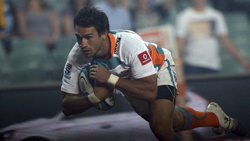 Robert Ebersohn from the Cheetahs of South Africa dives to score a try in Sydney on March 15, 2013