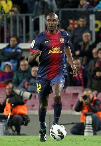 Barcelona&#039;s defender Eric Abidal controls the ball at the Camp Nou stadium in Barcelona on April 6, 2013