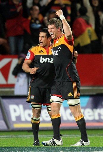 Michael Fitzgerald (R) and teammate Tanerau Latimer of the Waikato Chiefs, pictured in Hamilton, on August 4, 2012