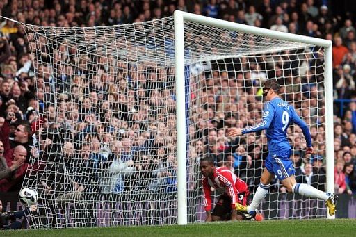 Chelsea&#039;s Fernando Torres follows the ball in the goal after an own goal on April 7, 2013