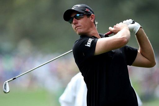 Nicolas Colsaerts hits a shot during a practice round ahead of the Masters tournament on April 8, 2013