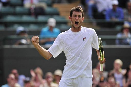 Britain&#039;s James Ward reacts at the All England Tennis Club in Wimbledon on June 28, 2012