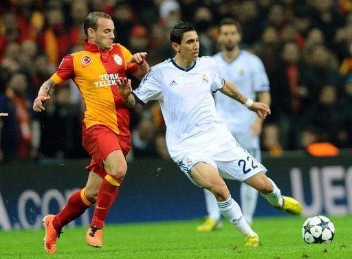 Real Madrid into last four despite defeat