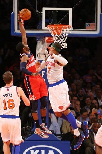 John Wall of the Washington Wizards dunks during their game against the New York Knicks on April 9, 2013