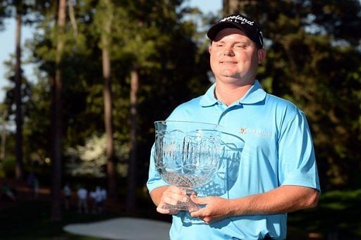 Ted Potter of the US celebrates after winning the the Par-3 Contest at Augusta National Golf Club on April 10, 2013