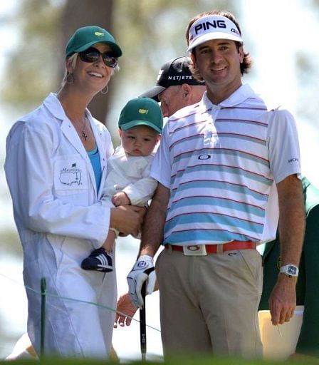 Bubba Watson is pictured with his wife Angie and son Caleb at the Par-3 Contest at Augusta National on April 10, 2013