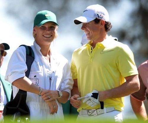 Rory McIlroy and Caroline Wozniacki are pictured during the Par-3 Contest at the Masters tournament on April 10, 2013