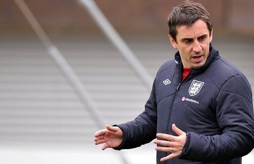 England assistant coach Gary Neville at a training session at the St George&#039;s Park training complex on March 19, 2013