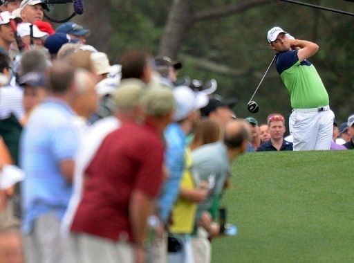 Australia&#039;s Marc Leishman hits a shot in Augusta, Georgia, on April 11, 2013