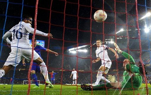 FC Basel&#039;s Aleksandar Dragovic (2nd L) scores his team&#039;s second goal against Tottenham Hotspur April 11, 2013