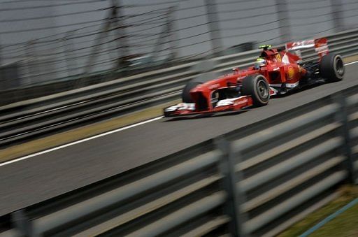 Ferrari&#039;s Felipe Massa enters the pit lane during the first practice session in Shanghai on April 12, 2013