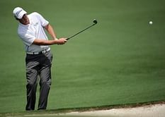 Tiger charges at least while Guan hit for slow play