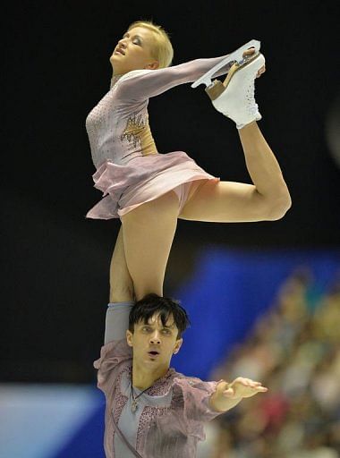 Tatiana Volosozhar (top) and Maxim Trankov of Russia perform in the pairs free skate in Tokyo on April 13, 2013