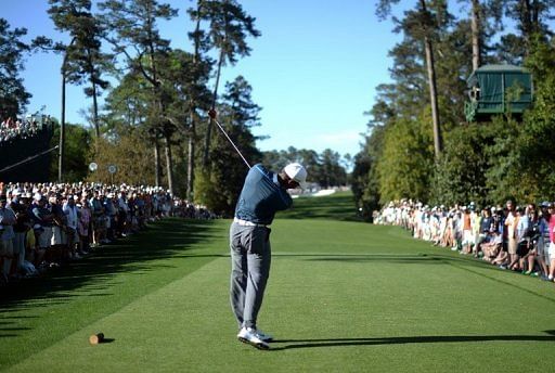 Tiger Woods of the US tees off during the third round of the 77th Masters, April 13, 2013 in Augusta, Georgia