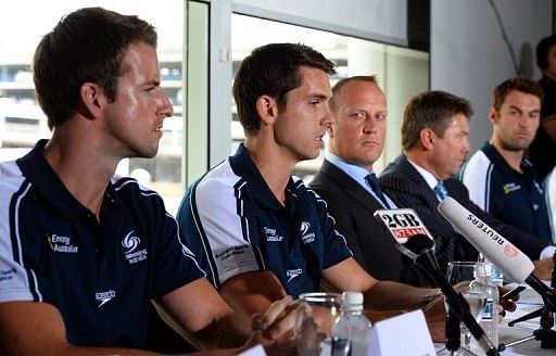 Eamon Sullivan (2nd L) and James Magnussen (L), seen during a press conference in Sydney, on February 22, 2013