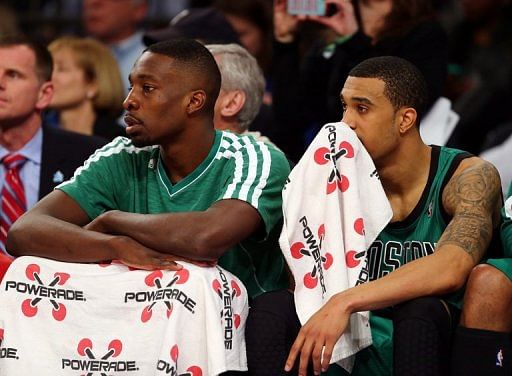 Jeff Green and Courtney Lee of the Boston Celtics look on from the bench  against the New York Knicks on March 31, 2013