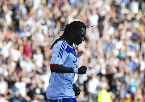 Lyon&#039;s Bafetimbi Gomis reacts after scoring on April 14, 2013, at the Gerland Stadium in Lyon