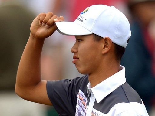 Guan Tianlang of China is pictured during the fourth round on April 14, 2013 in Augusta