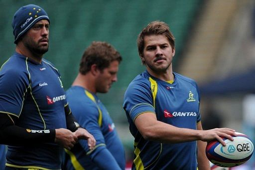 Wallabies winger Drew Mitchell (R) is pictured during a team training session in London on November 16, 2012