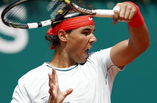 Spain&#039;s Rafael Nadal hits a return to Australia&#039;s Marinko Matosevic on April 17, 2013 during the Monte Carlo Masters