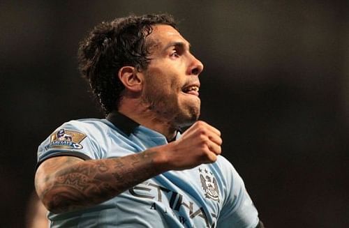 Manchester City's Carlos Tevez celebrates scoring in Manchester on April 17, 2013