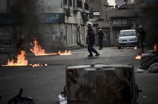 Bahraini police clash with protesters against the upcoming Bahrain Formula One Grand Prix, in Sanabis, on April 13, 2013