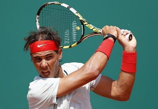 Rafael Nadal plays a shot during a Monte-Carlo ATP Masters Series Tournament match in Monaco on April 18, 2013