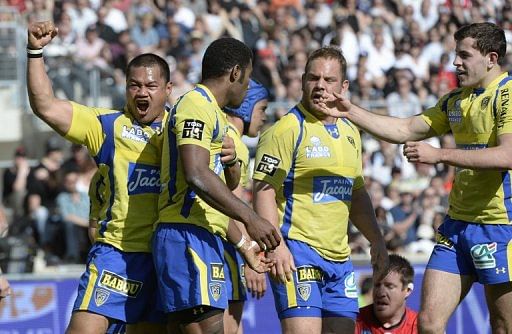 Clermont&#039;s players celebrate after scoring a try against Toulon at the Velodrome stadium in Marseille, on April 14, 2013