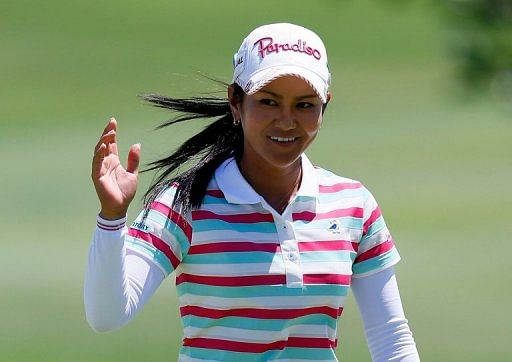Ai Miyazato reacts after a birdie putt on the 4th green at the Ko Olina Golf Club in Kapolei, Hawaii, on April 18, 2013