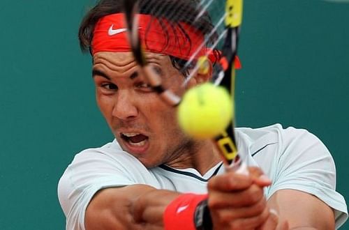 Rafael Nadal hits a return to Grigor Dimitrov during the Monte Carlo Masters in Monaco, on April 19, 2013