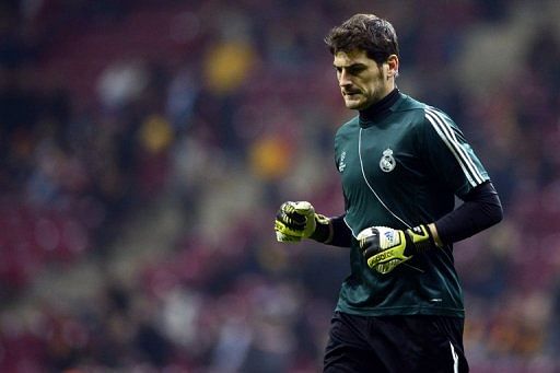 Real Madrid&#039;s goalkeeper and captain Iker Casillas takes part in the warm up on April 9, 2013 in Istanbul
