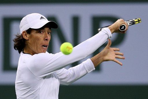 Francesca Schiavone hits a return at Indian Wells on March 8, 2013