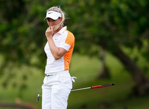 Suzann Pettersen mulls a putt in the third round of the LPGA LOTTE Championship on April 19, 2013