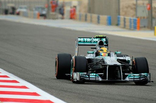 Lewis Hamilton drives during the qualifing session in Manama on April 20, 2013 ahead of the Bahrain F1 Grand Prix