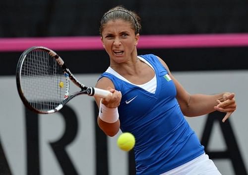 Sara Errani of Italy hits a return to Lucie Safarova of Czech Republic on April 20, 2013 in Palermo