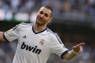 Real Madrid's forward Karim Benzema celebrates after scoring in Madrid on April 20, 2013