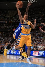 Andre Miller of the Denver Nuggets lays in the game-winning shot against Golden State Warriors on April 20, 2013