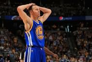 Stephen Curry of the Golden State Warriors reacts after a play against the Denver Nuggets on April 20, 2013
